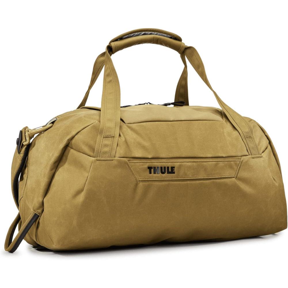 imageThule Aion 35L Duffel  Waterresistant waxed canvas  Fits 16quot MacBook  Internal divider ampamp separate compartment for dirty clothes  Multipurpose bag for travel ampamp daily commuteNutria