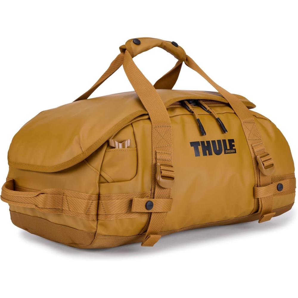 imageThule Chasm Duffel bag Weatherresistant materials Easy packing Converts to backpack Internal pockets TravelreadyGOLDEN BROWN