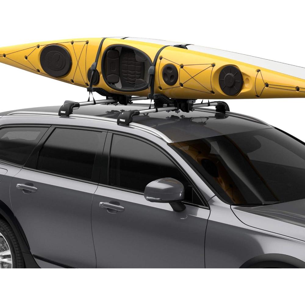 imageThule Compass Kayak and SUP roof rack  Carries 2 kayaks or 2 SUPs  Jstyle carrier  Universal mounting hardware included  Fits 36quot wide kayaks and SUPs  130lb weight limit