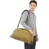 Thule Aion 35L Duffel – Water-resistant waxed canvas – Fits 16″ MacBook – Internal divider & separate compartment for dirty clothes – Multipurpose bag for travel & daily commute(Nutria)